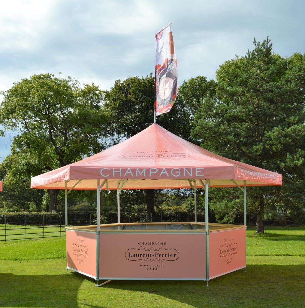 6-sided outdoor event bar with laurent perrier branding on roof & base panels