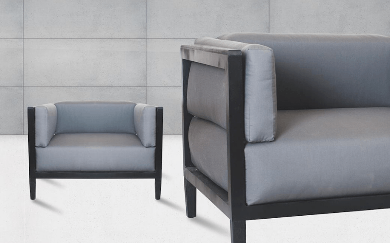 Armchair in black aluminium with Grey chunky cushions