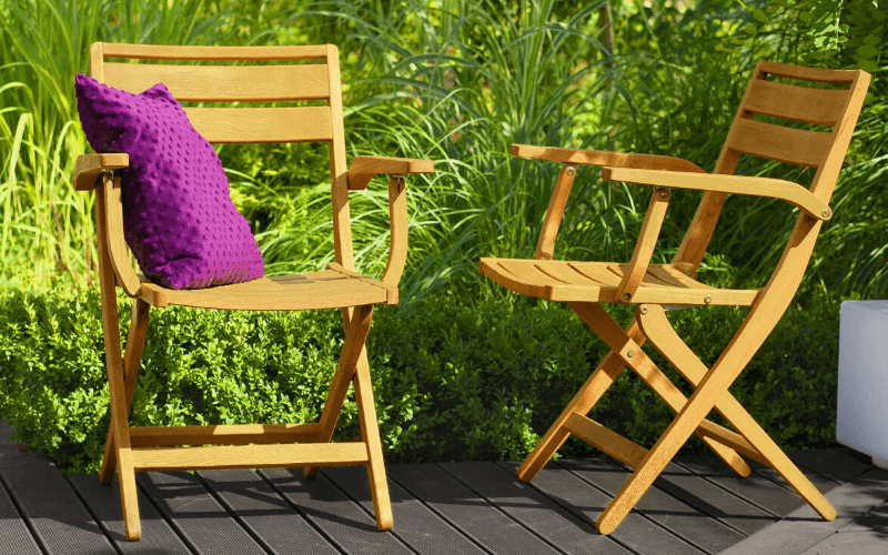 Armchairs on a decking terrace setting
