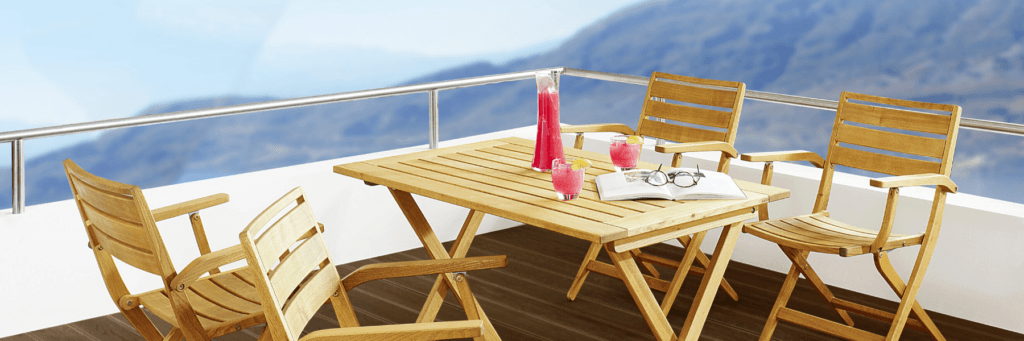 Foldable Armchairs with table in a hotel balcony restaurant terrace setting