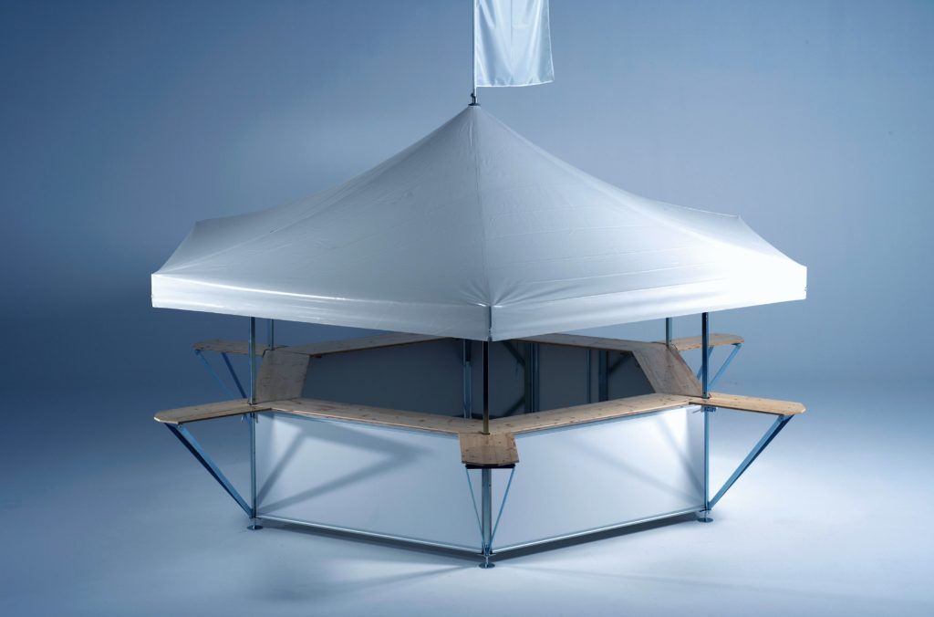 Studio image of Hexagonal Pavilion set up with no branding – roof and base panels are plain white