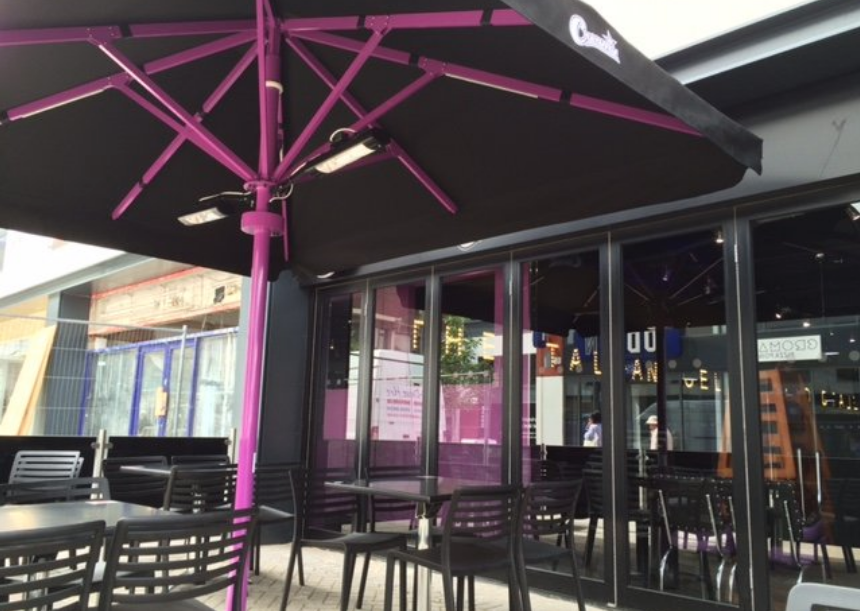 Giant Bella Parasol with bespoke contrasting framework and fabric colours ideal for hospitality industry to extend the outdoor terrace including river terraces
